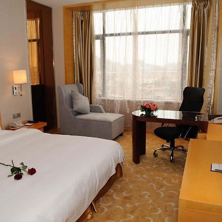 Shanghai Sky Rainbow Hotel Quarto foto